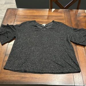 Heathered charcoal grey flutter sleeve knit sweater top with neckline detail